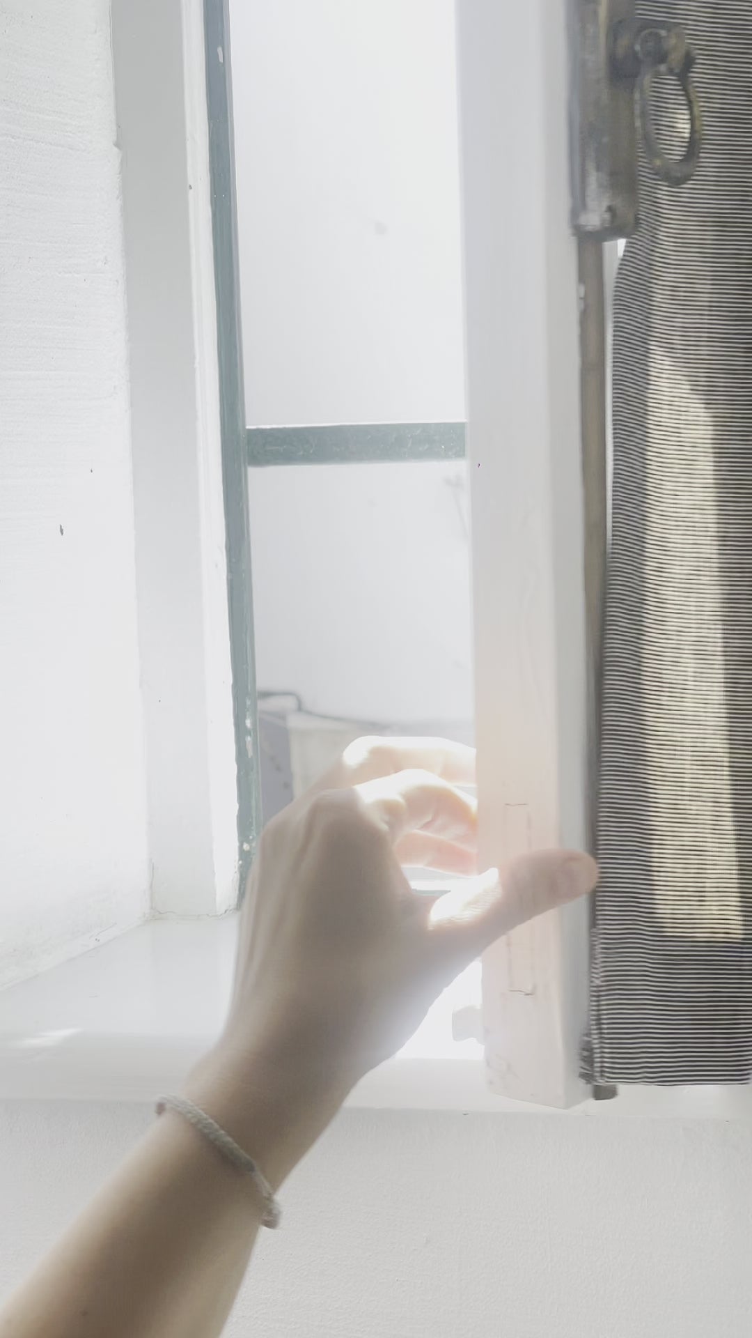 White matte candle holder with speckle effect.  Width: 10 cm.